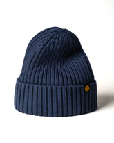 Dusty Navy Classic Beanie with a brand logo on a white background