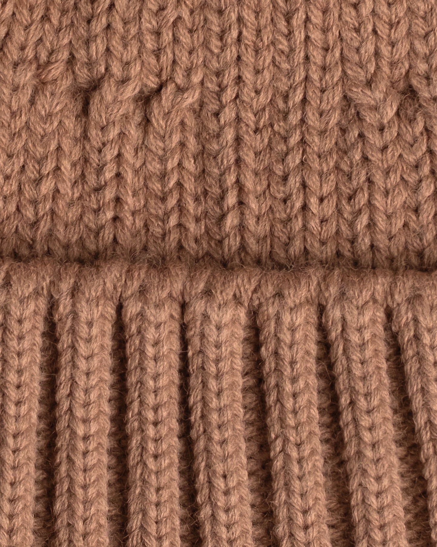 close look of dusty pink fisherman beanie