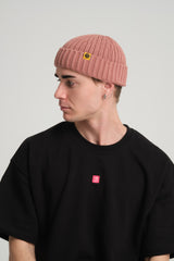 side view of a man wearing Dusty Pink Fisherman Beanie