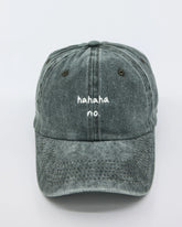 front view of Hahaha No Dark Green Washed Cap