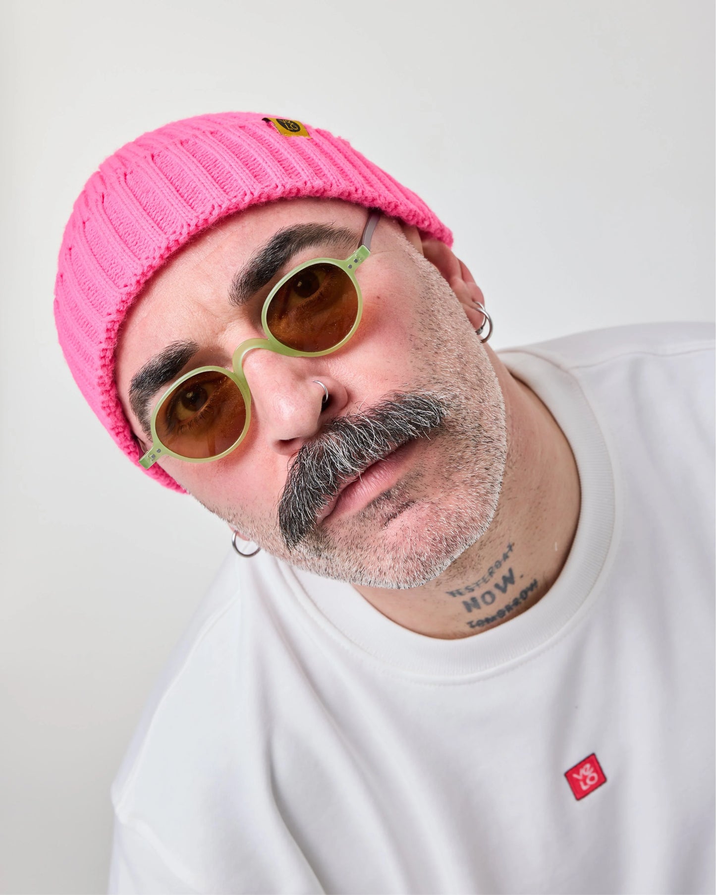 front view of a man wearing Fuchsia Fisherman Beanie