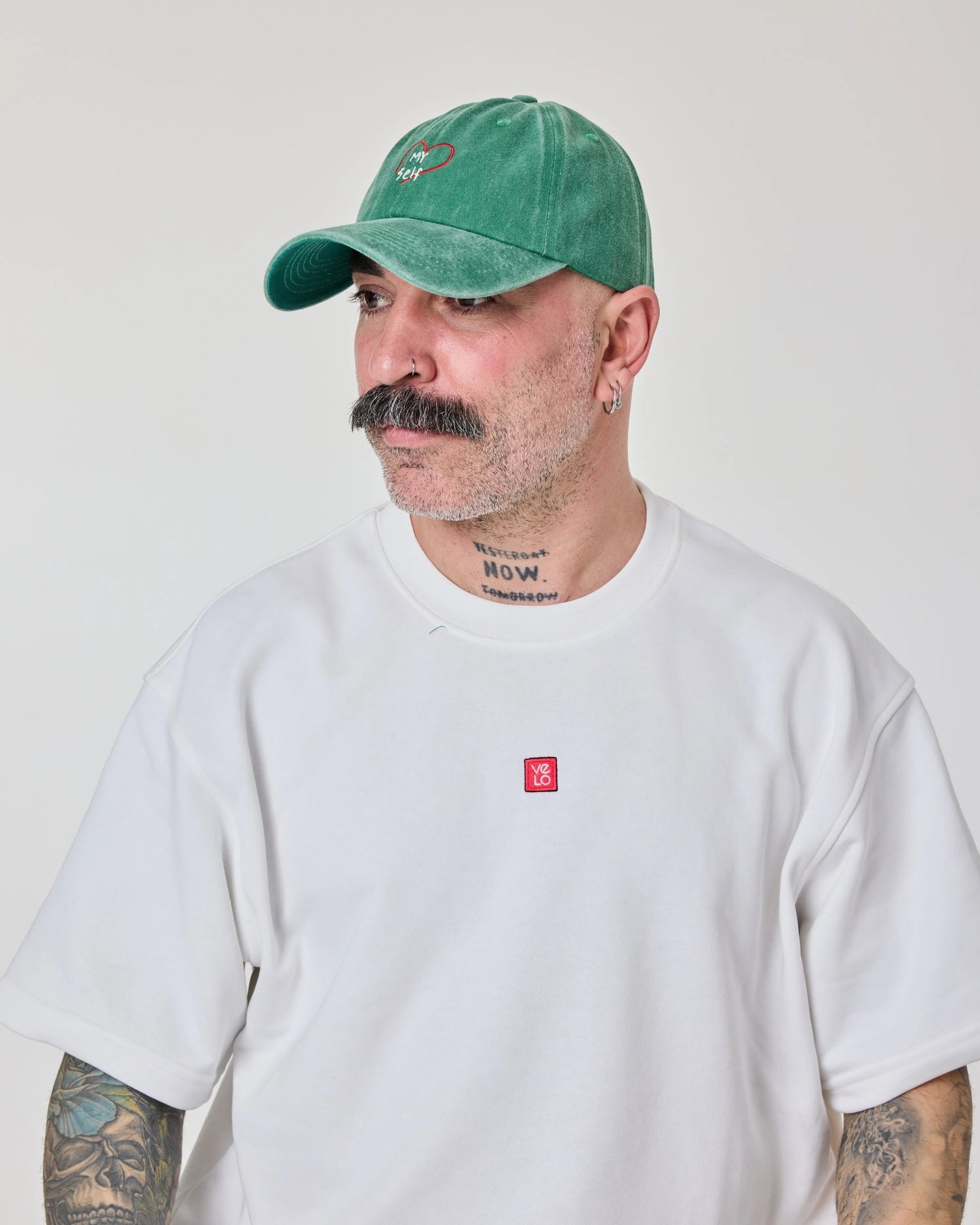 man wearing Green Love Myself Washed Cap