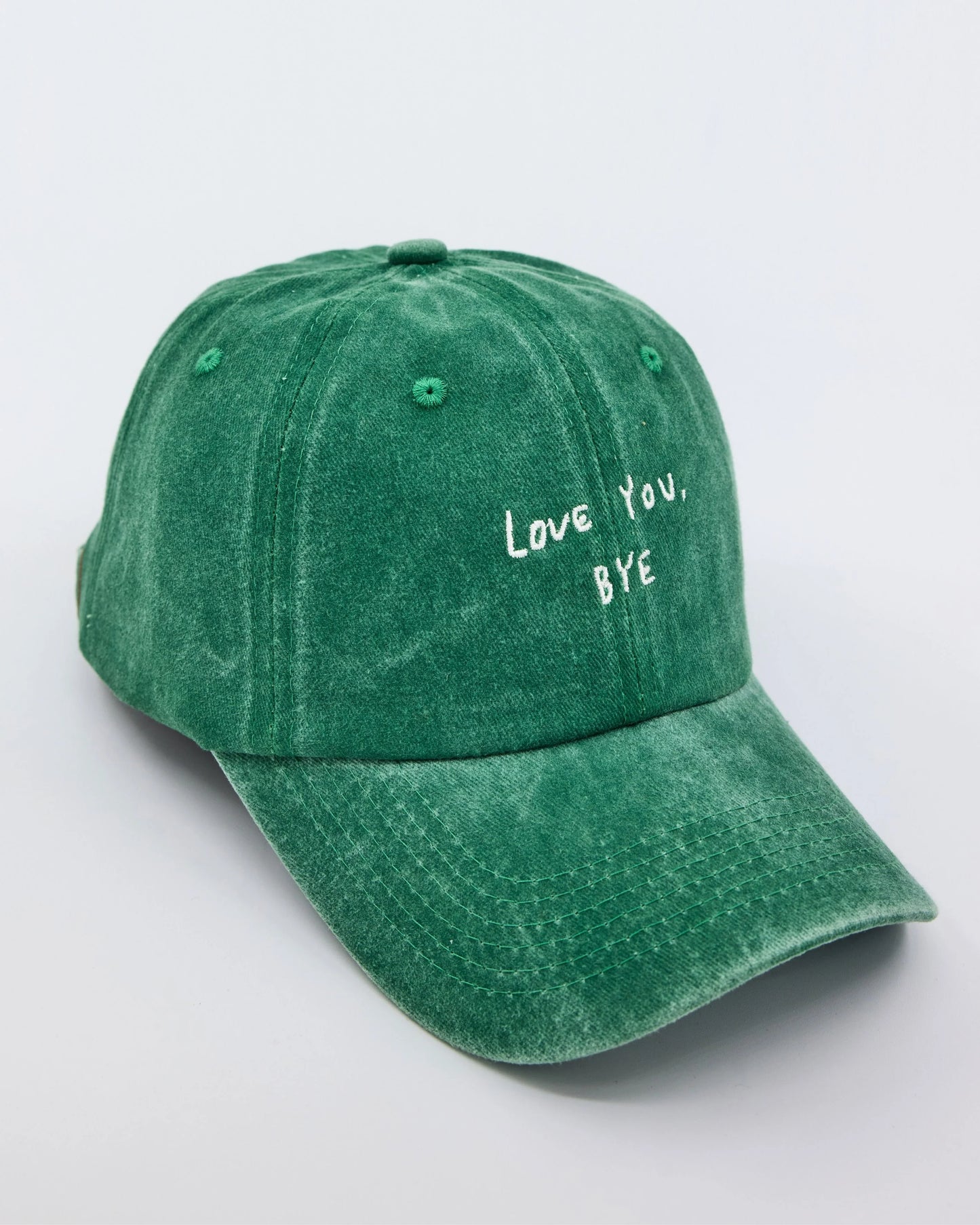 side view of Love You Bye Green Washed Cap