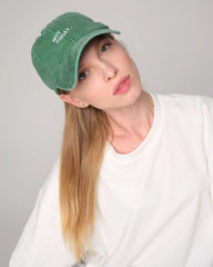 woman wearing Not Today Green Washed Cap
