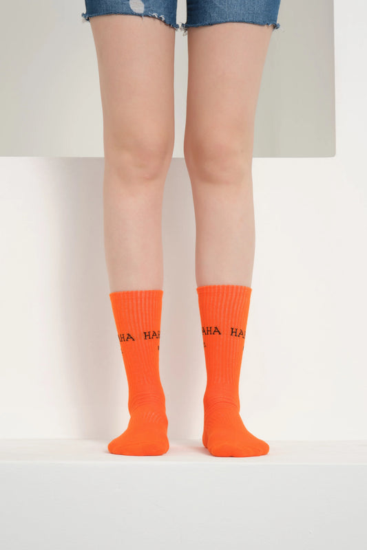 front view of orange hahaha no socks