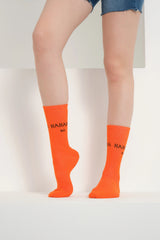 side view of orange hahaha no socks