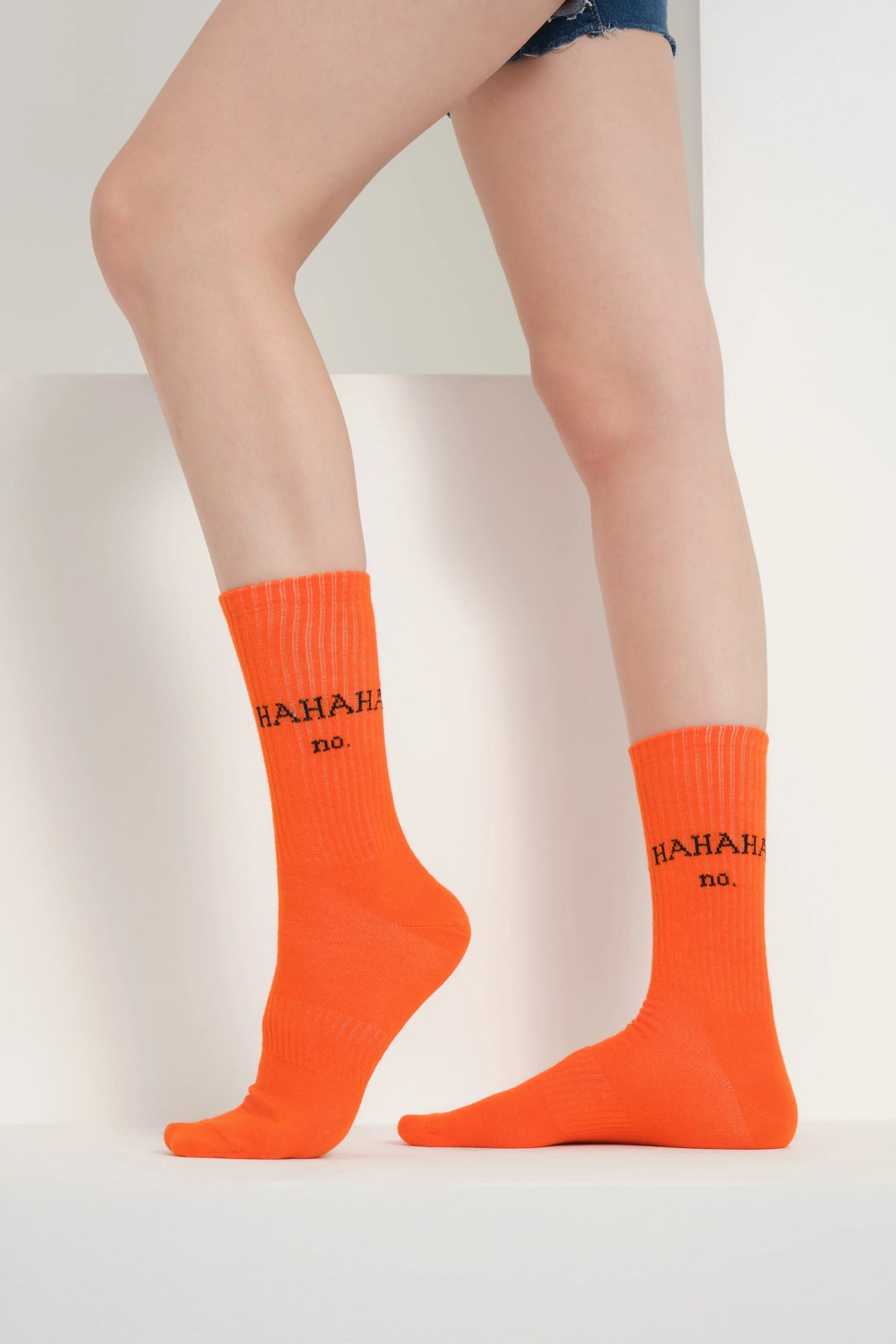 side view of orange hahaha no socks