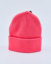 Hot pink beanie on a light gray background