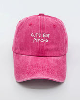 front view of Cute But Psycho Hot Pink Washed Cap