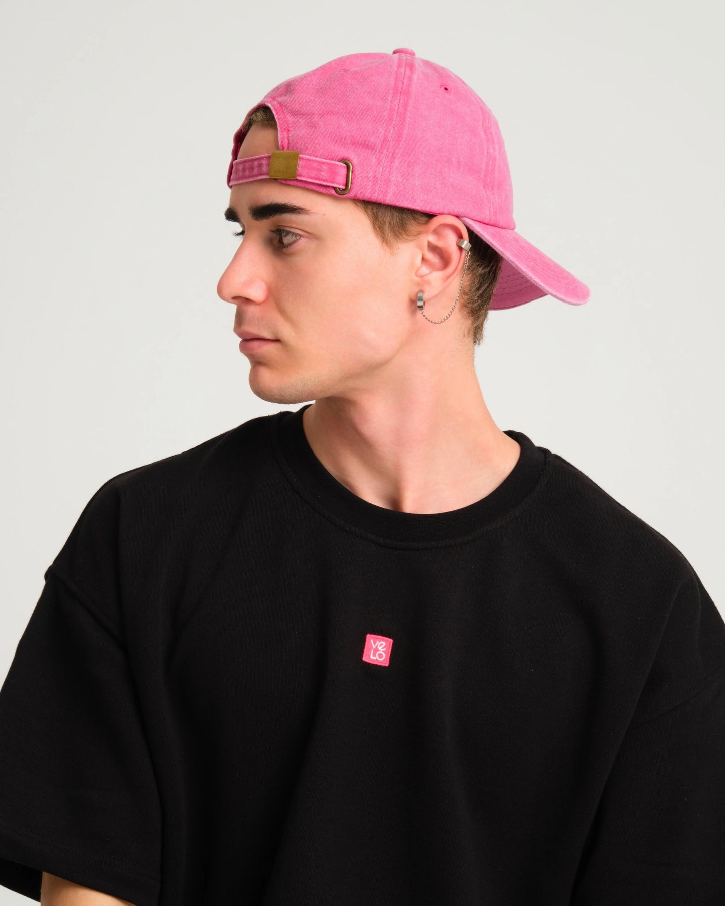 man wearing Cute But Psycho Hot Pink Washed Cap