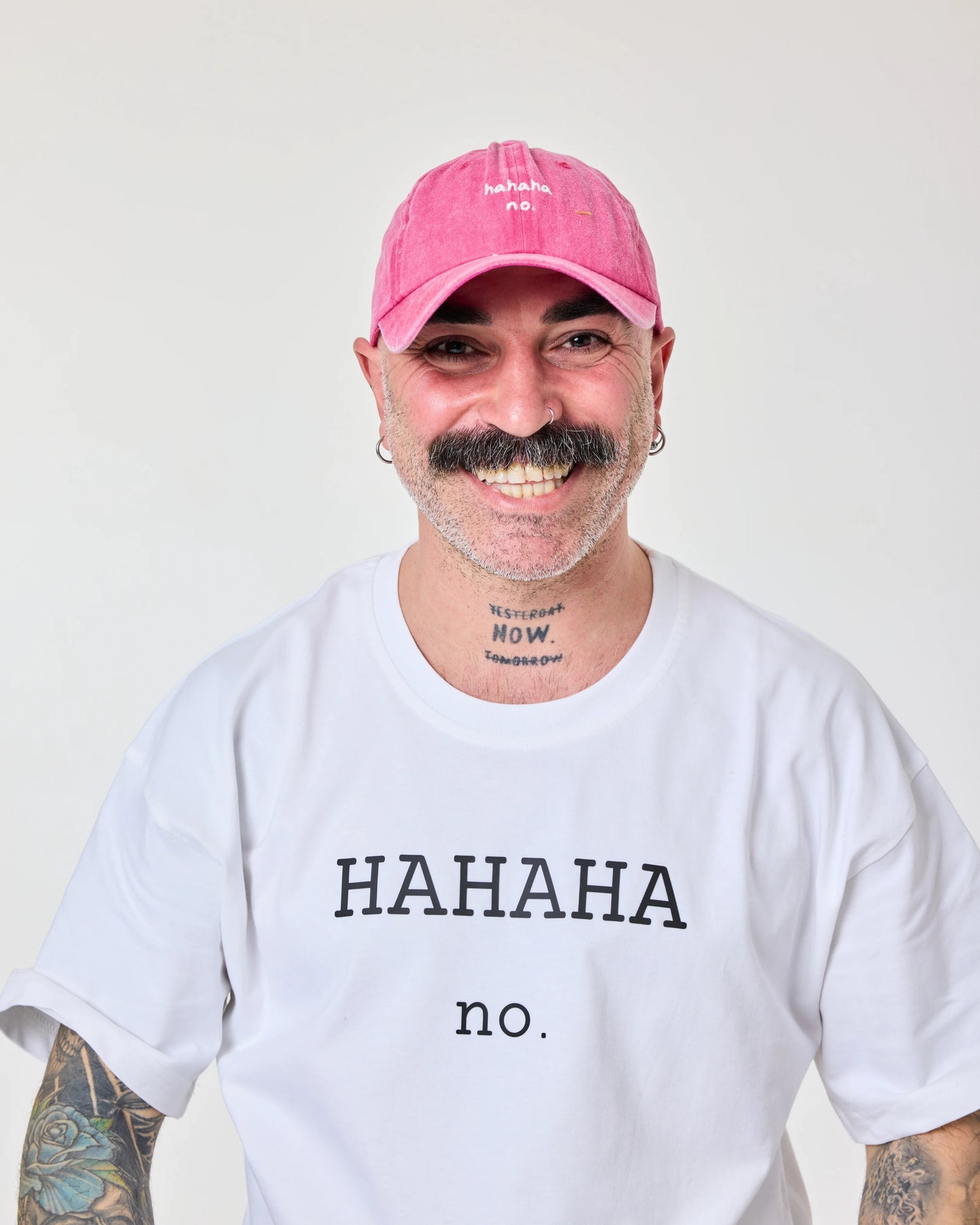 man wearing Hahaha No Hot Pink Washed Cap