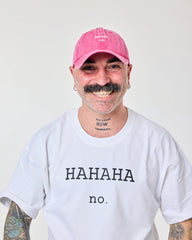 man wearing Hahaha No Hot Pink Washed Cap
