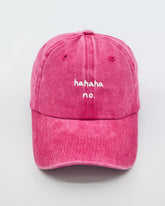 front view of Hahaha No Hot Pink Washed Cap
