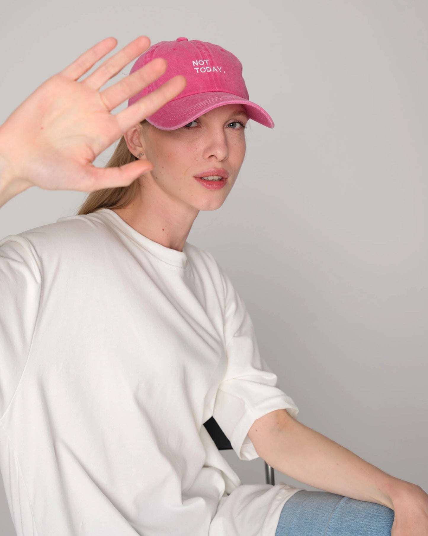woman wearing Hot Pink Washed Cap with Not Today embroidered in white
