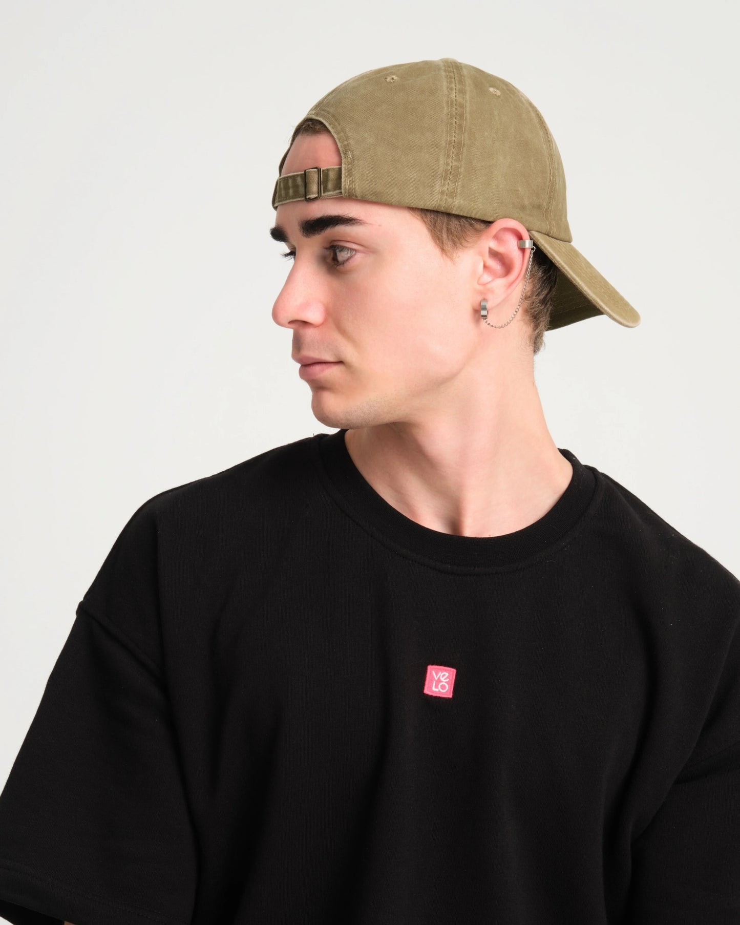 side view of man wearing Cute But Psycho Khaki Washed Cap