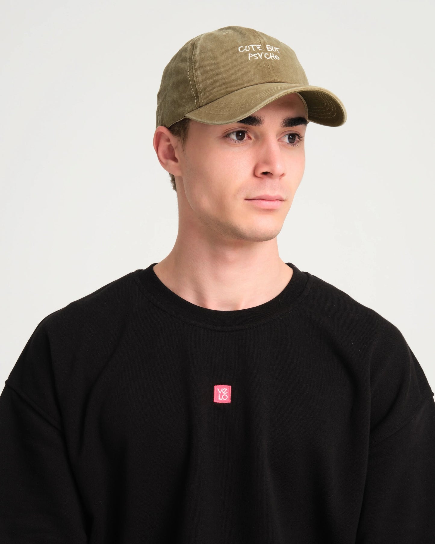 man wearing Cute But Psycho Khaki Washed Cap