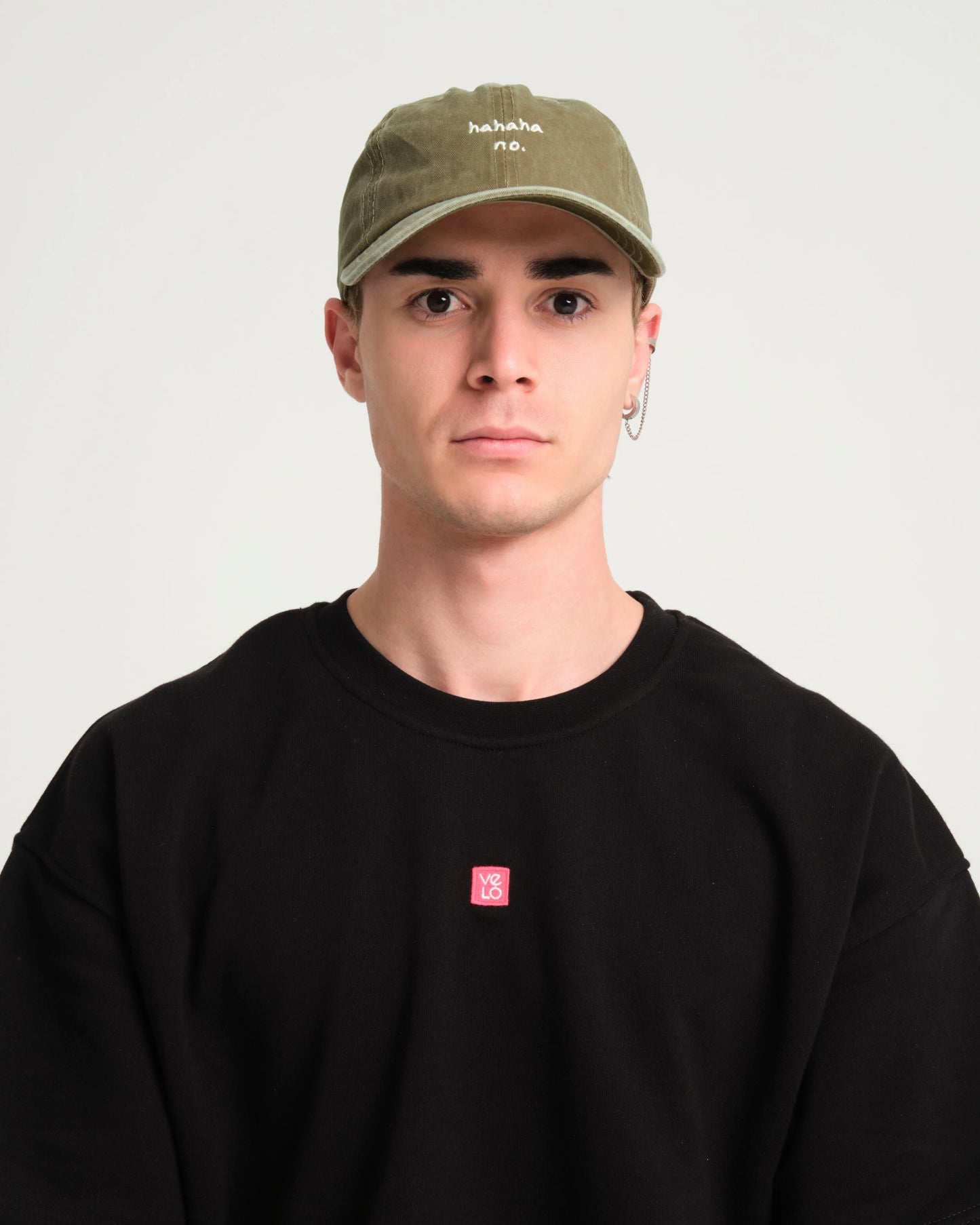 man wearing Hahaha No Khaki Washed Cap