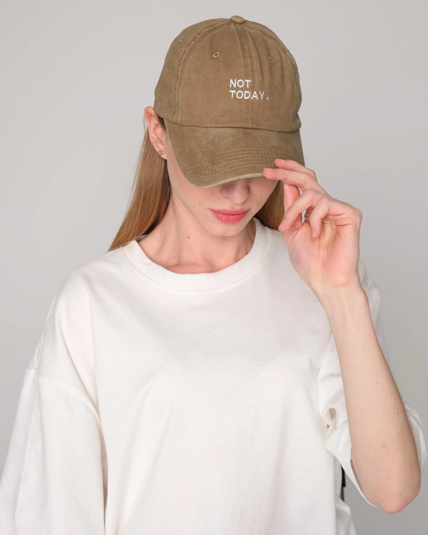woman wearing Khaki Washed Cap with Not Today embroidered in white