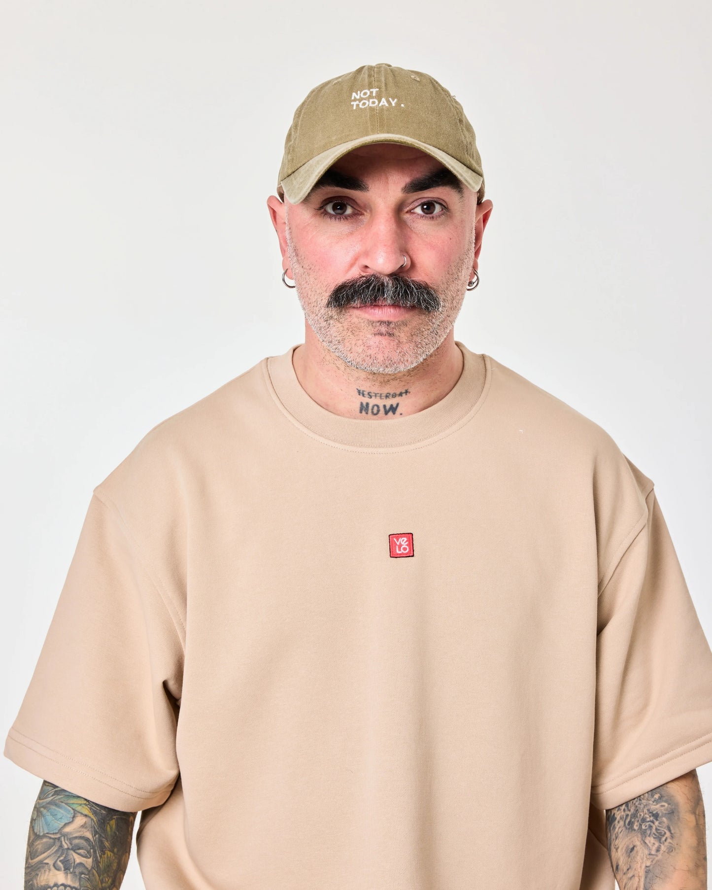 man wearing Khaki Washed Cap with Not Today embroidered in white