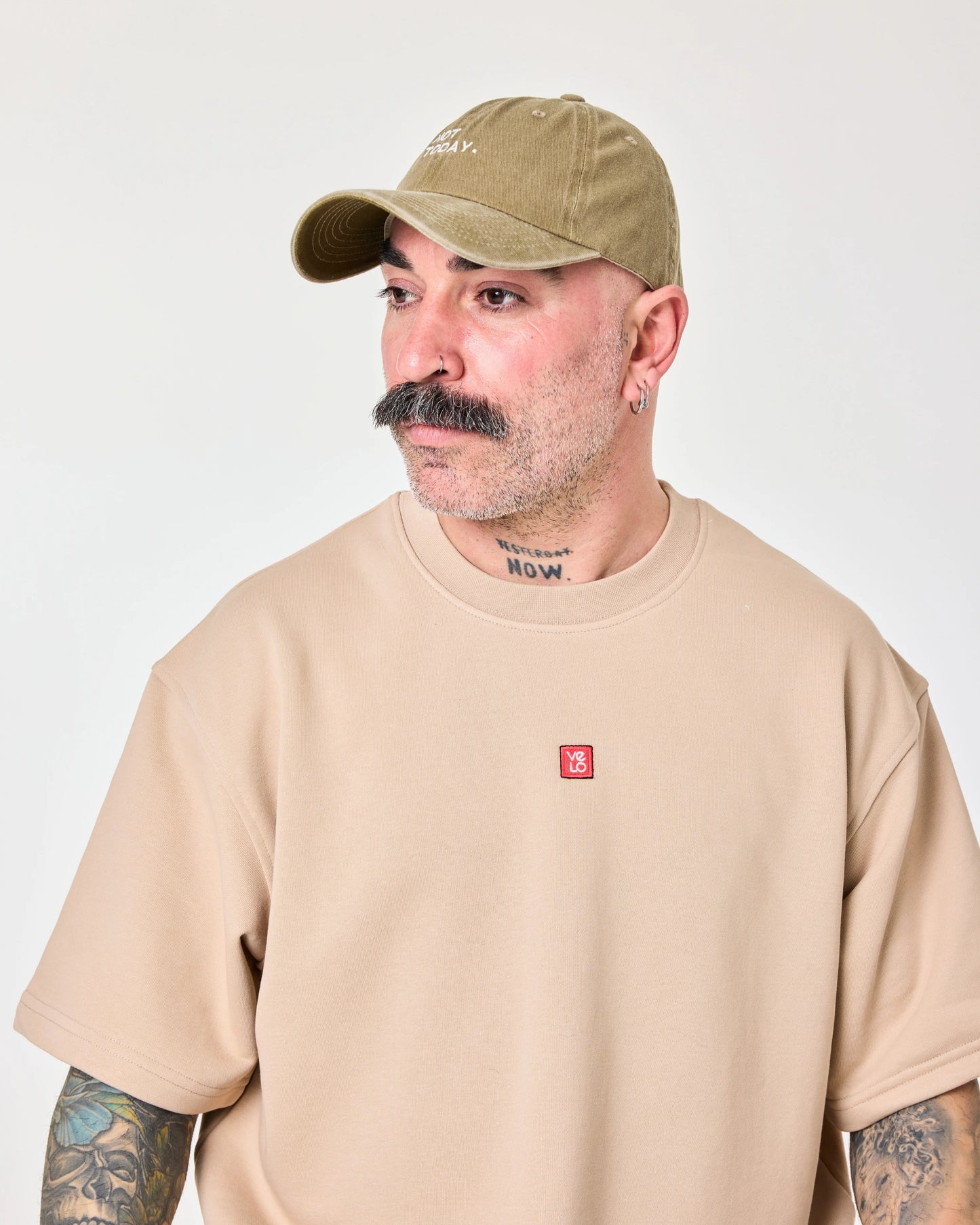 man wearing Khaki Washed Cap with Not Today embroidered in white
