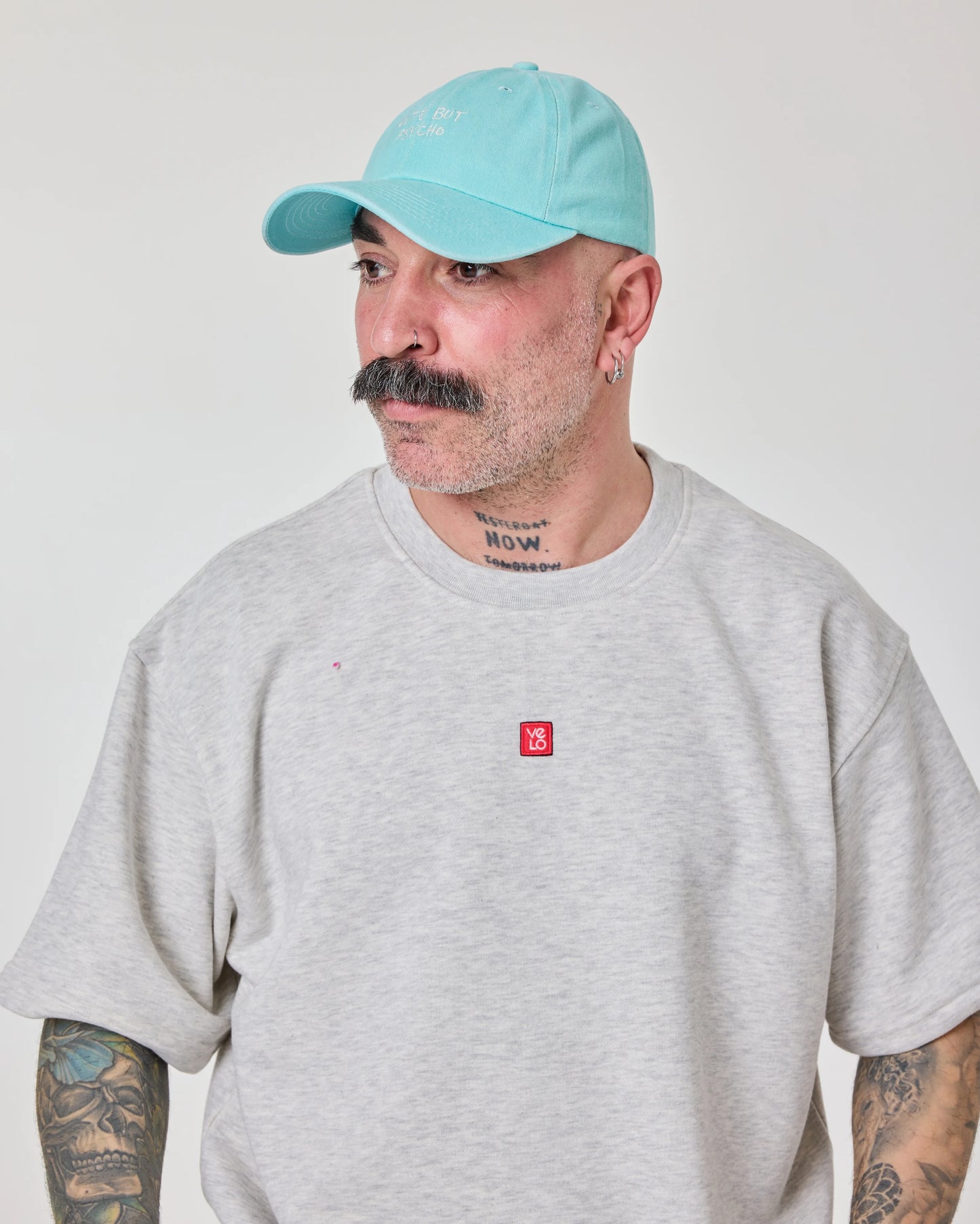 man wearing Cute But Psycho Light Blue Washed Cap Hat