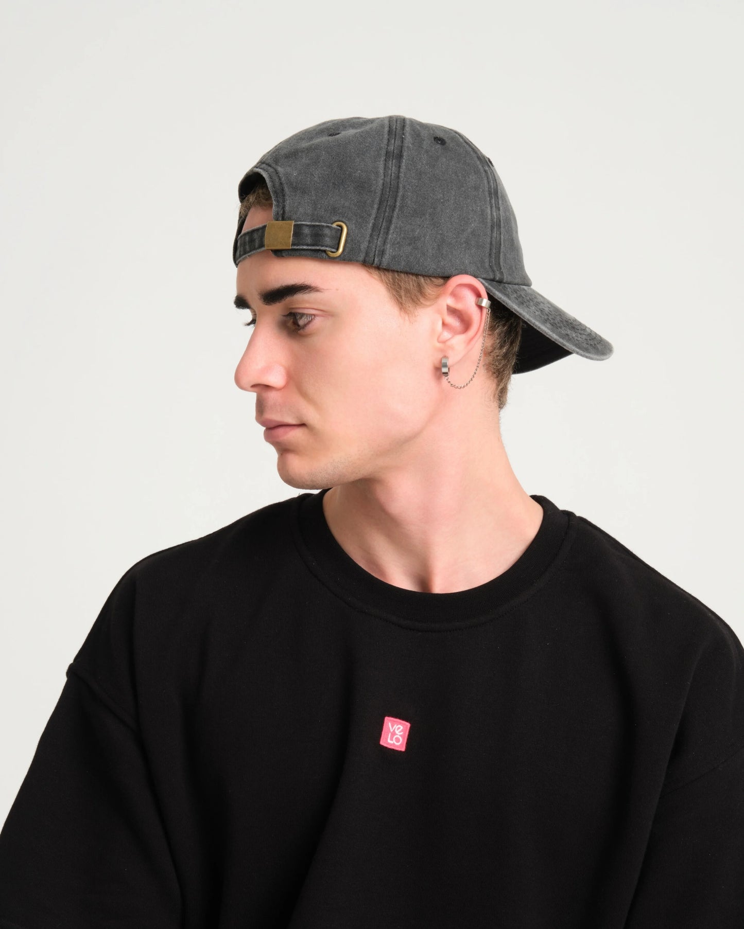 side view of man wearing Hahaha No Light Gray Washed Cap