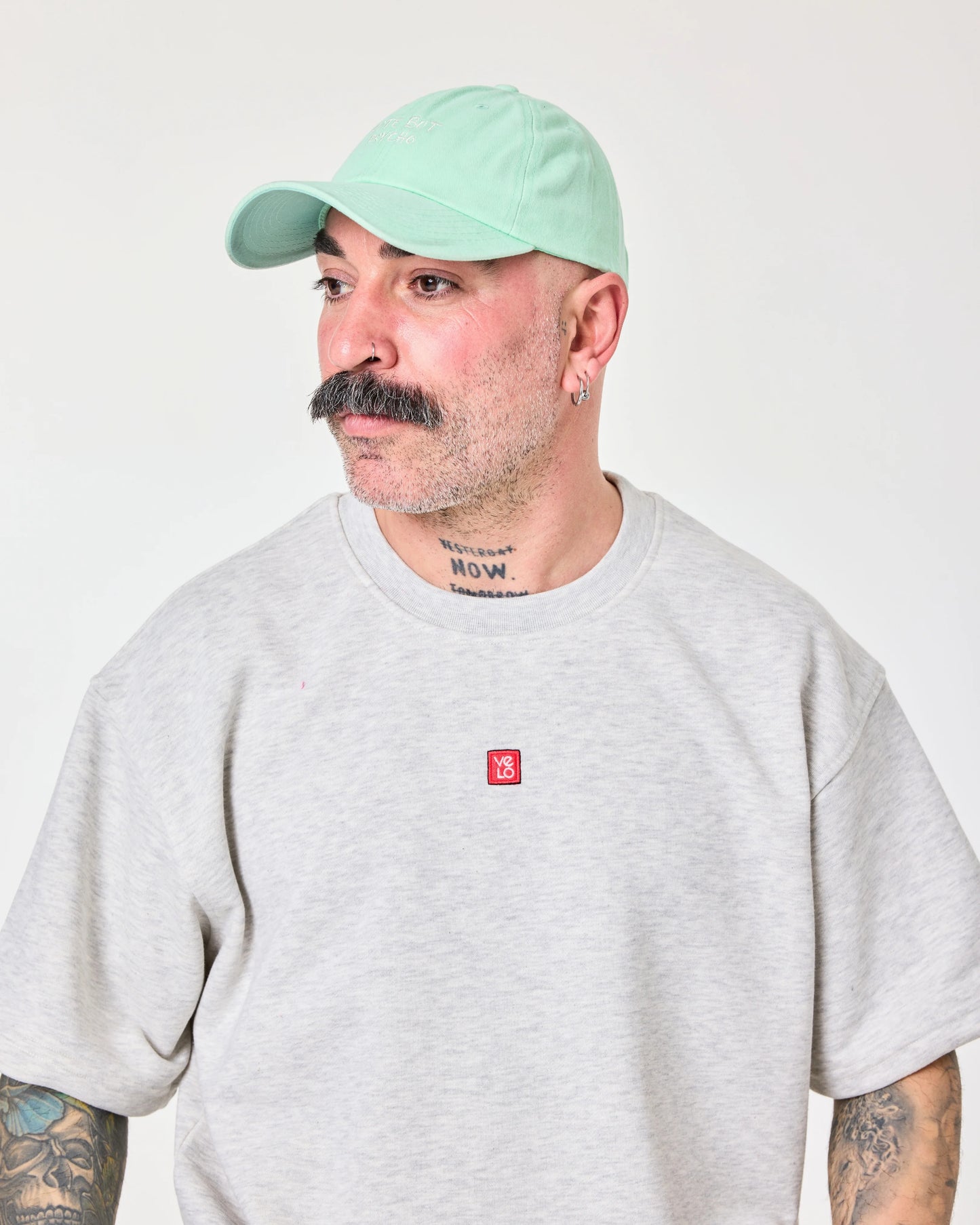 man wearing Cute But Psycho Light Green Cap