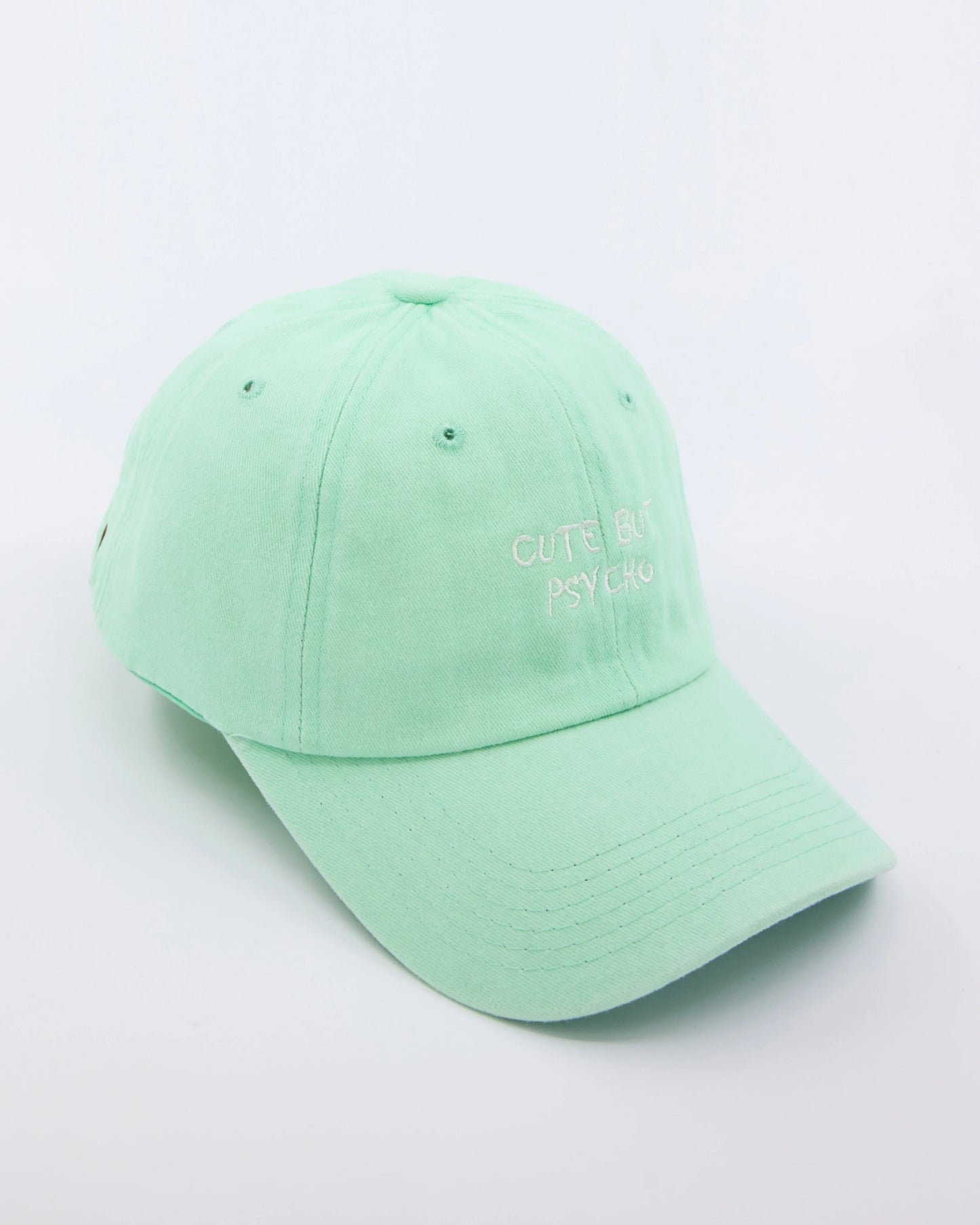 side view of Cute But Psycho Light Green Cap