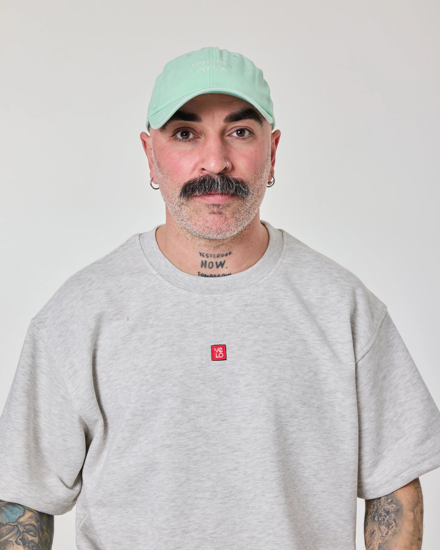 man wearing Cute But Psycho Light Green Cap Hat