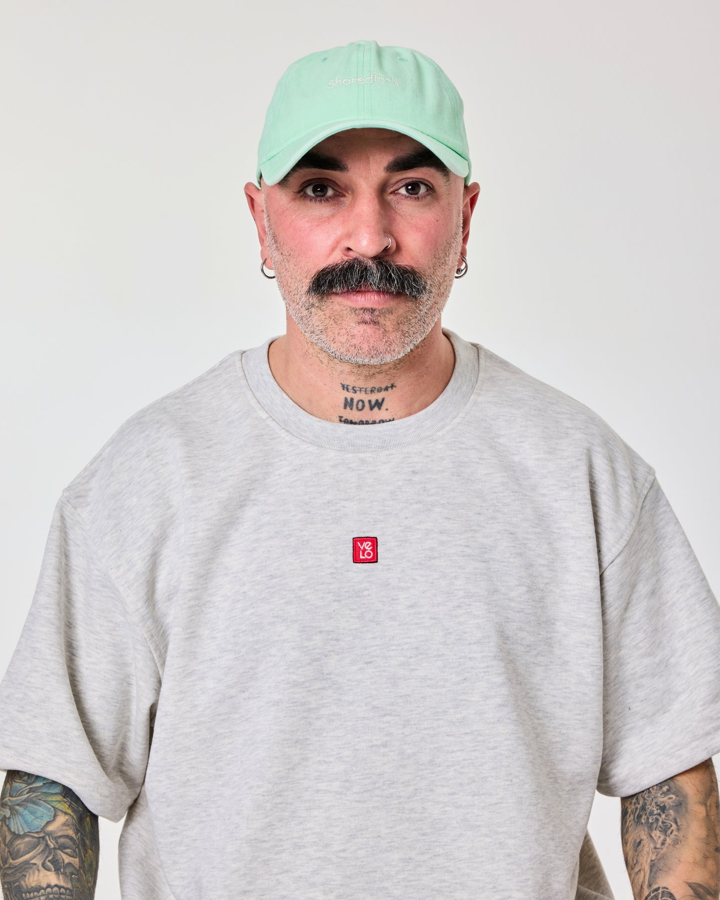 front view of a man wearing Shoreditch Light Green Washed Cap