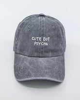 front view of Cute But Psycho Light Grey Washed Cap