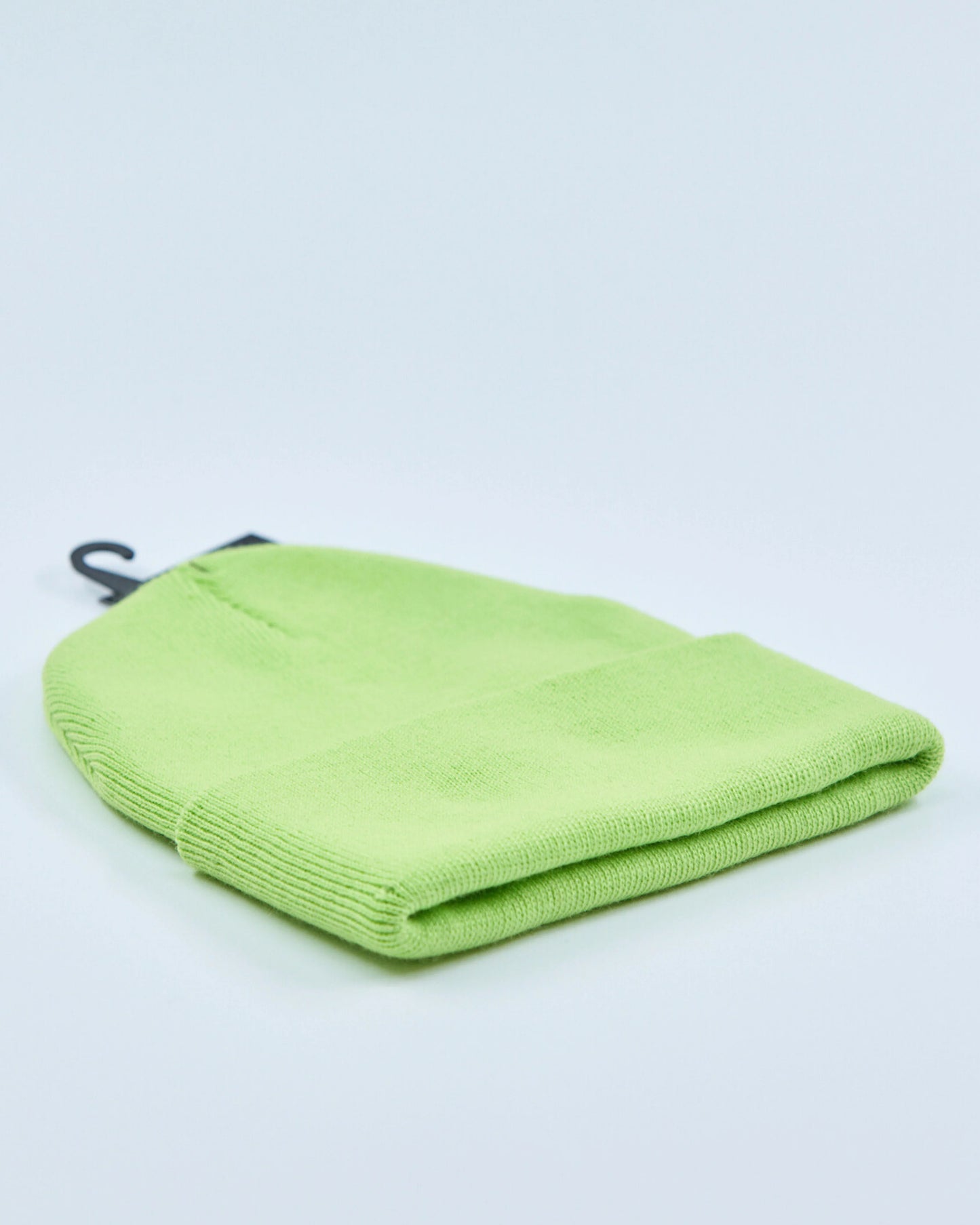Light lime beanie on a light gray background