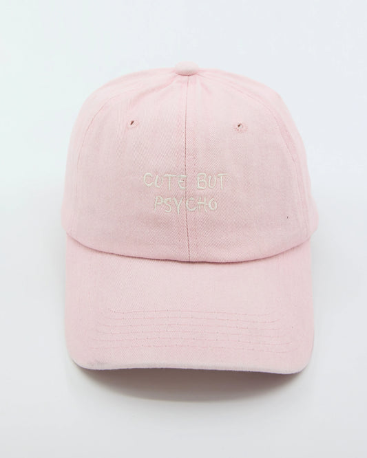 front view of Cute But Psycho Light Pink Washed Cap
