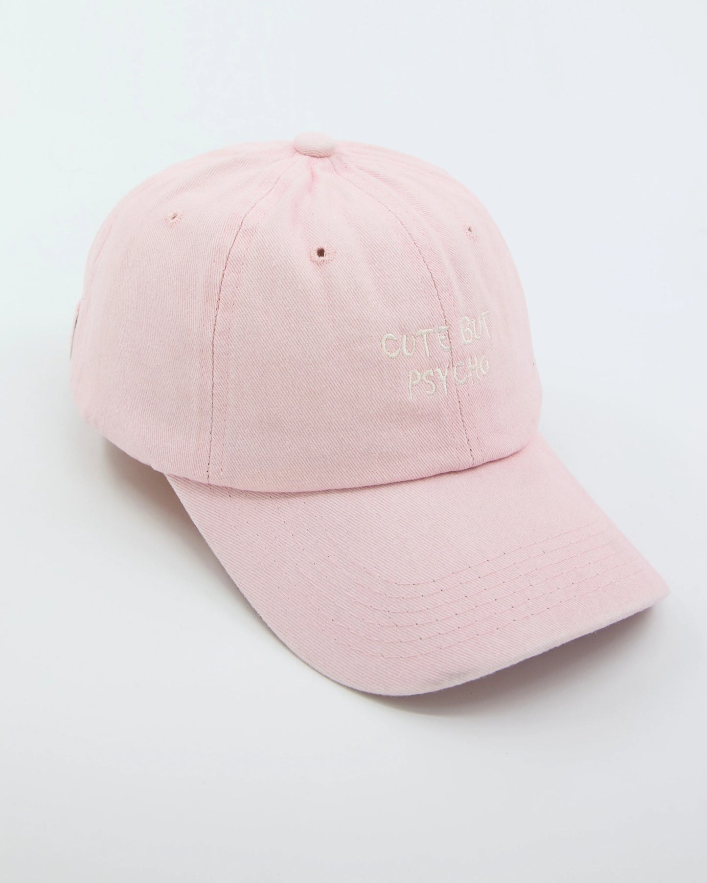 side view of Cute But Psycho Light Pink Washed Cap