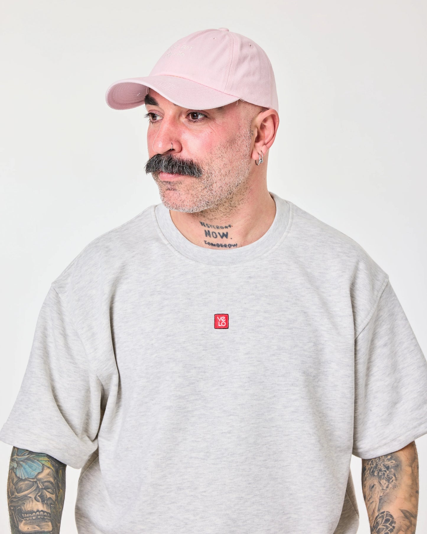 side view of man wearing Cute But Psycho Light Pink Washed Cap