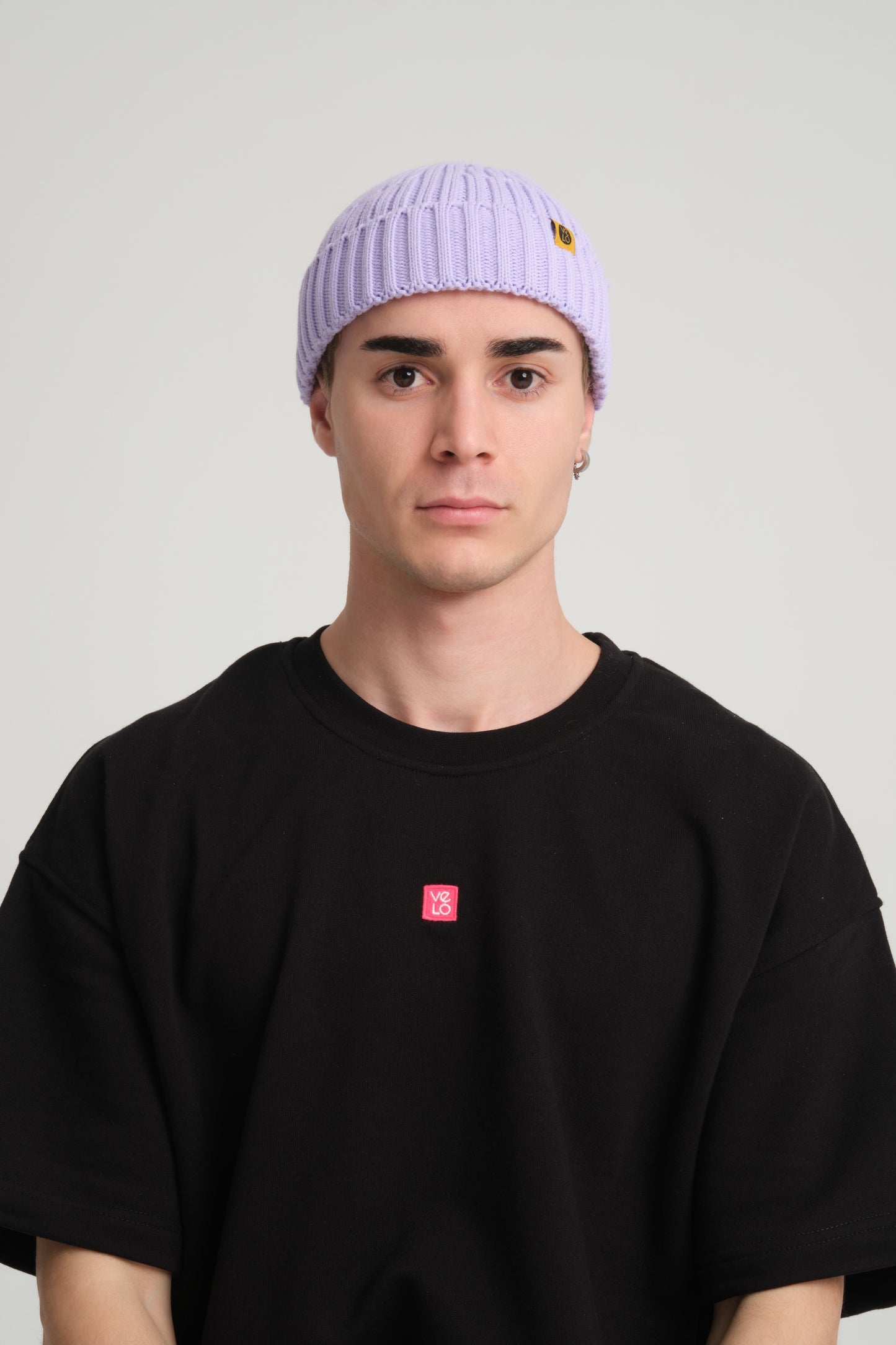 front view of a man wearing Lilac Fisherman Beanie