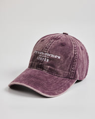 Side view of London Plum Washed Cap
