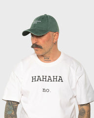 A man wearing the London Dark Green Washed Cap