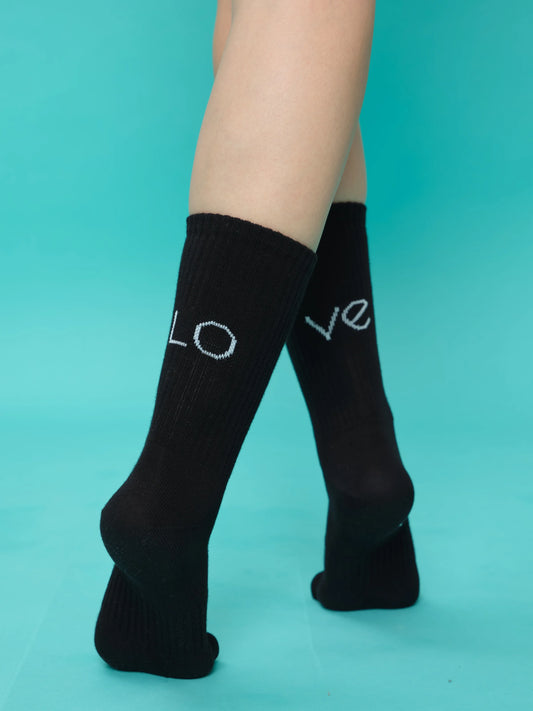 back view of black love socks