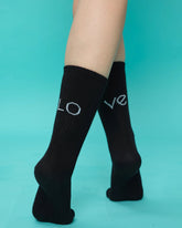 back view of black love socks