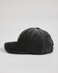 Matcha Club Black Washed Caps on a light gray background