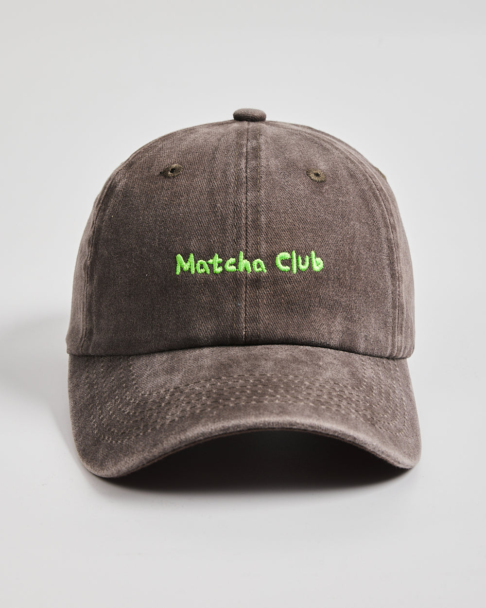 Front view of Matcha Club Brown Washed Caps