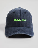 Front view of Matcha Club Navy Washed Caps