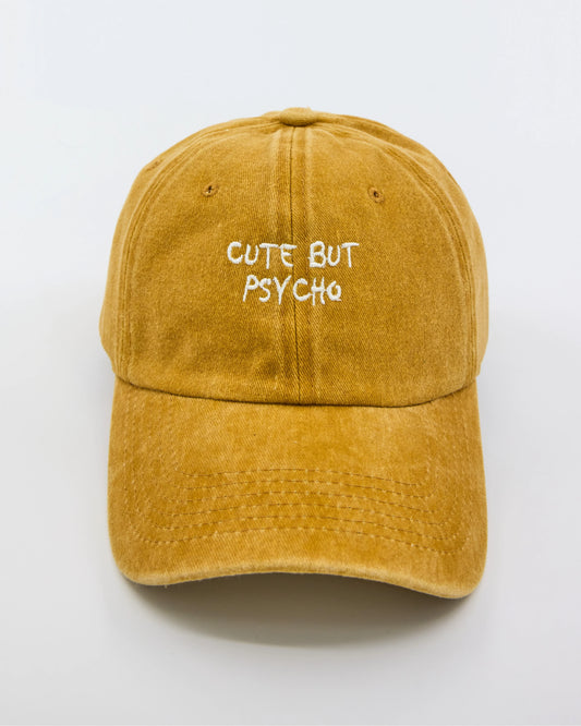 front view of Cute But Psycho Mustard Washed Cap