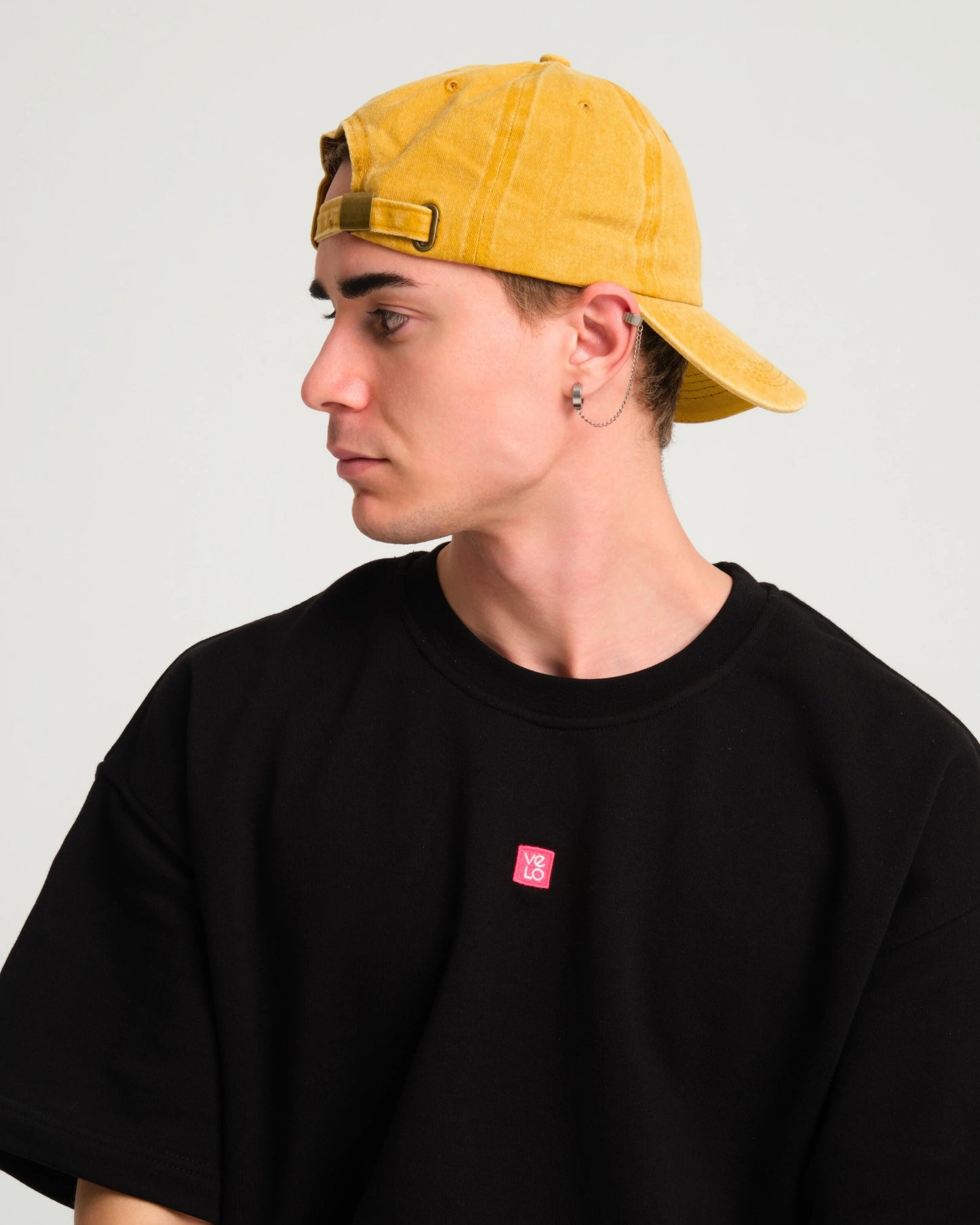 man wearing Cute But Psycho Mustard Washed Cap