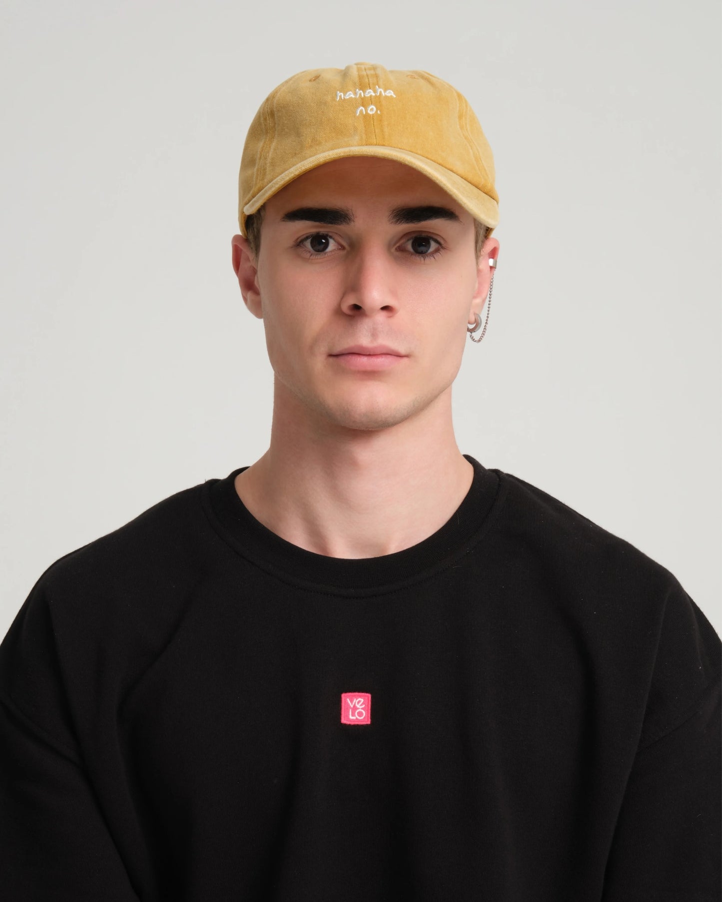 man wearing Mustard Hahaha No Washed Cap