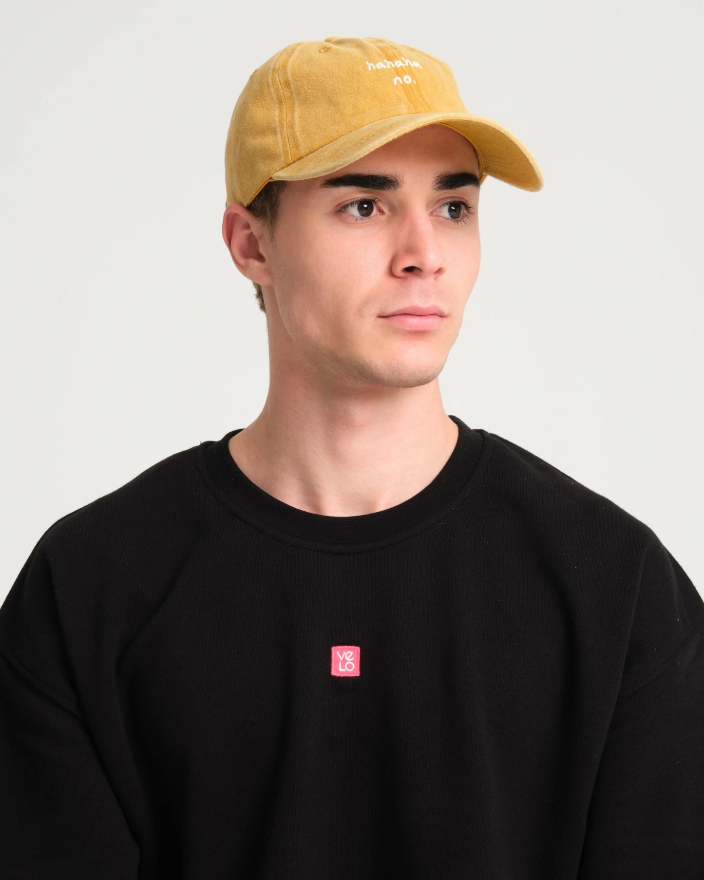 man wearing Mustard Hahaha No Washed Cap