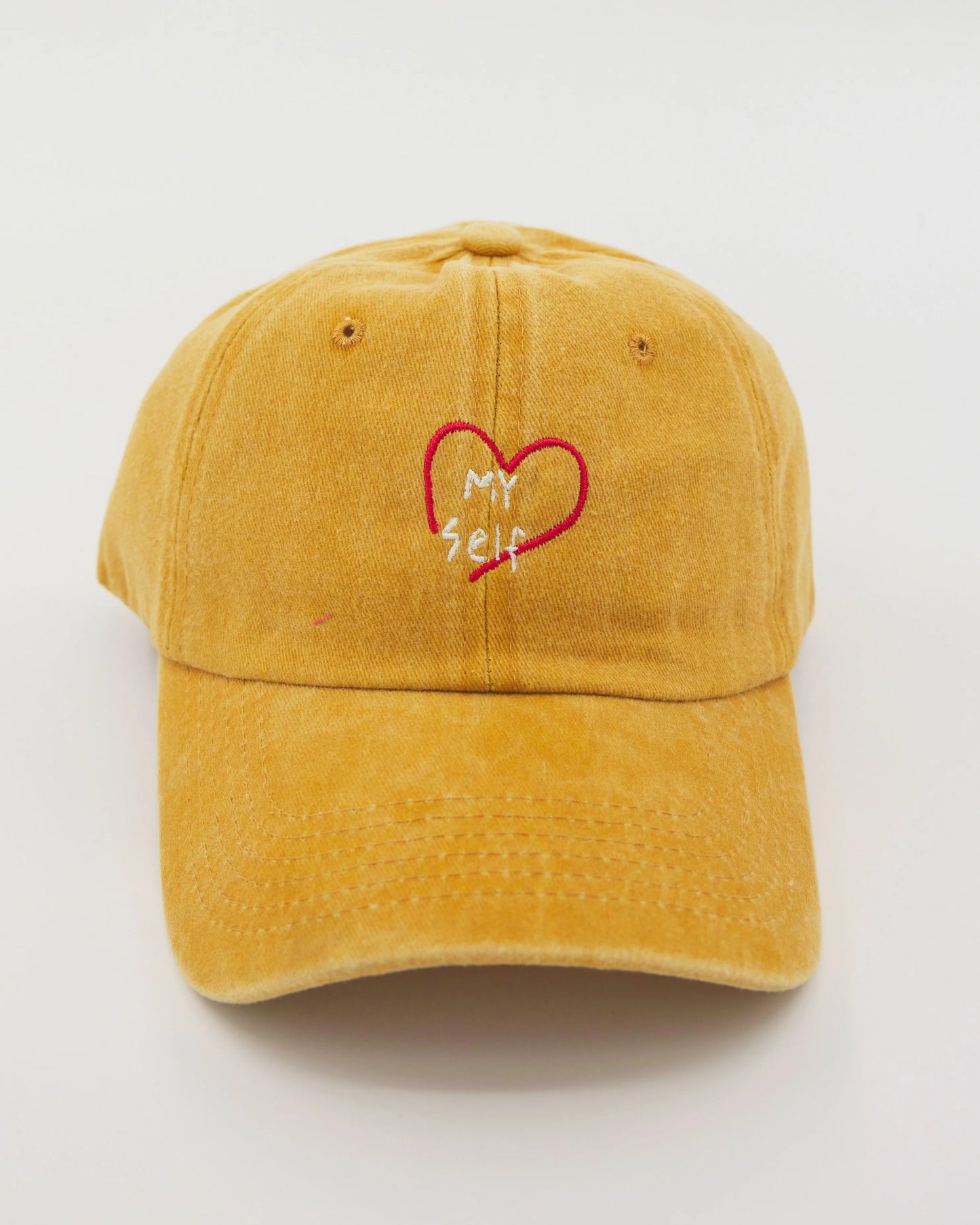 front view of Love Myself Mustard Washed Cap
