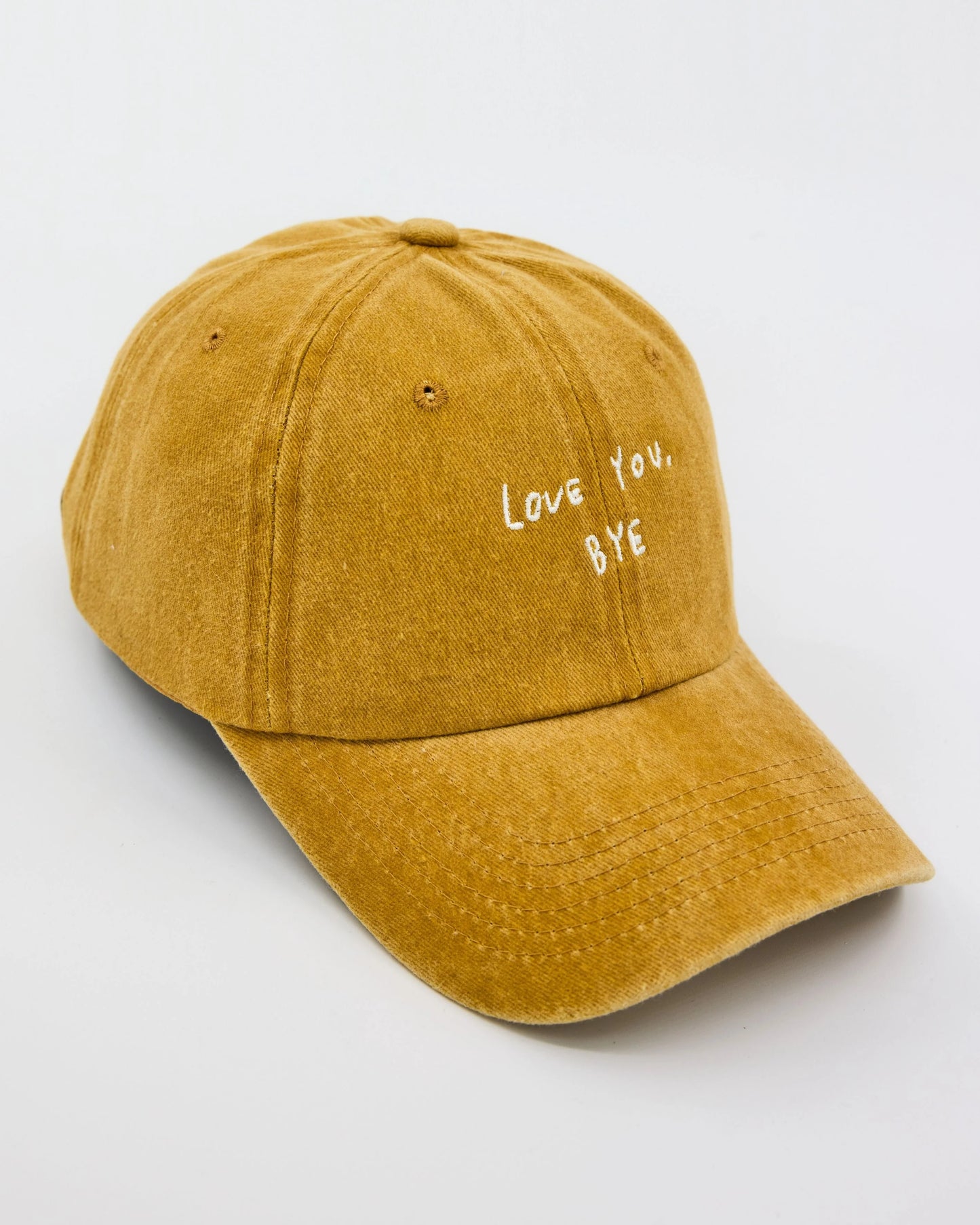 side view of Love You Bye Mustard Washed Cap
