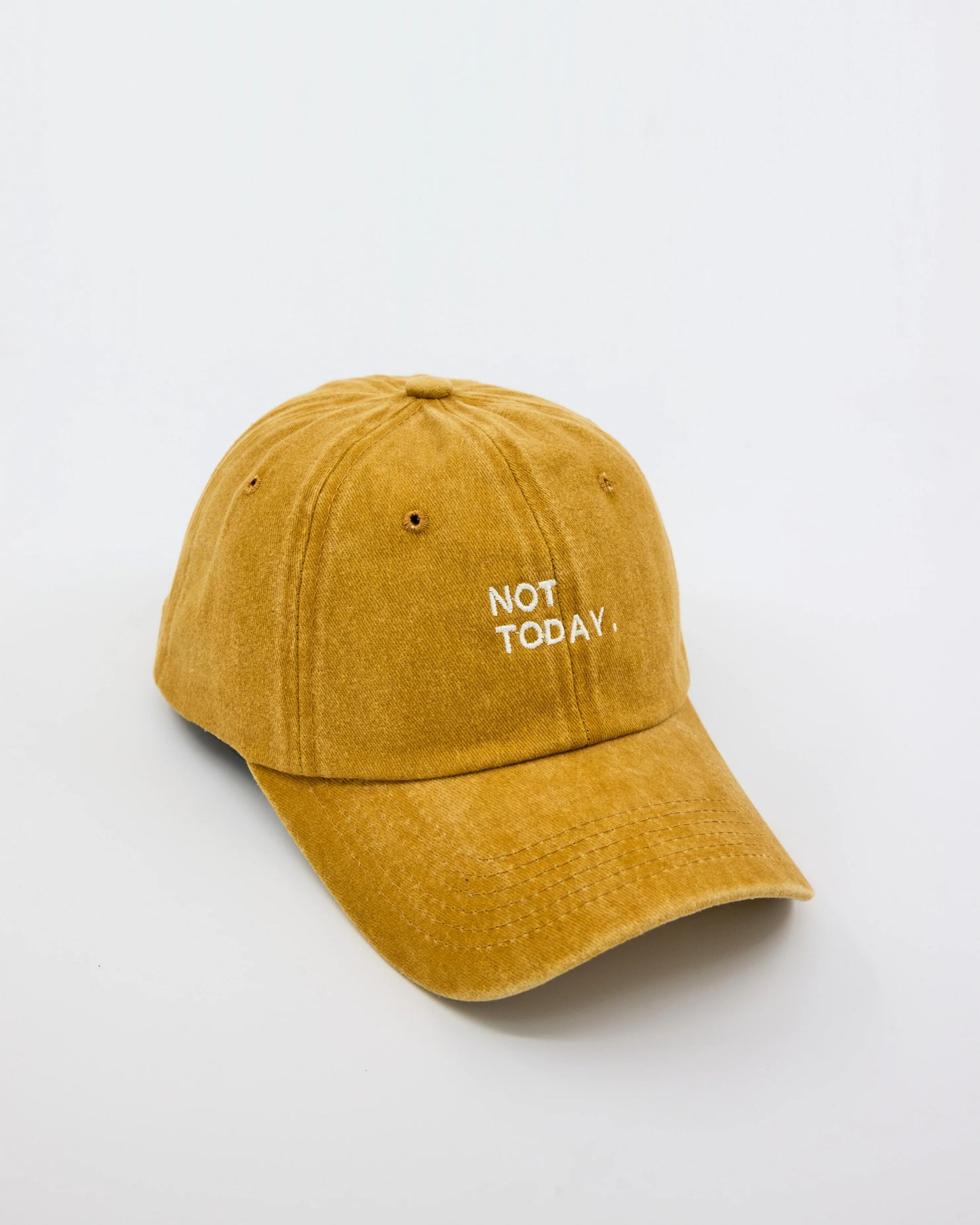side view of Mustard Washed Cap with Not Today embroidered in white
